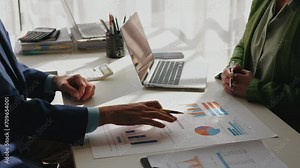 Close up of hands teamwork business group are calculate working and brainstorming about business financial and marketing.