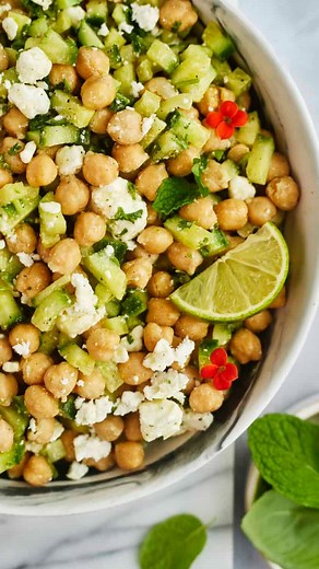 Alia & Radwa Elkaffas on Instagram: "This amazing chickpea and feta cucumber salad is light, super refreshing, and made with just 6 simple ingredients. Perfect to top your chicken, fish, or enjoy as a meatless main or side dish. Don’t forget to let us know what you think, we love getting your reviews and pics! Comment CHICKPEA RECIPE and we’ll DM you the full recipe and the link to this bowl! #salad #easyrecepies #feta #meatless #veggies #fooddolls"