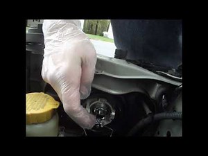 2004 Subaru Forester low beam headlamp removal and replacement instructions