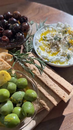 Cortney LaCorte on Instagram: "Holiday series: Marinated Olive Board! Hosting rule #1: always have something on the board that makes people go “wait… what is that?” Enter my marinated olives with @pearls_olives. 🫒✨ #sponsored Blue Cheese Stuffed Citrus–Vermouth Olives INGREDIENTS: 1 jar @Pearls_Olives Specialties Castelvetrano Olives 3 oz creamy blue cheese Zest of 1 lemon Zest of 1 orange 1 small garlic clove, crushed A few sprigs of fresh thyme 1 strip orange peel and 1 strip lemon peel 2–3 t