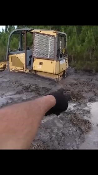 Stuck dozer in the swamp! Can we get it out