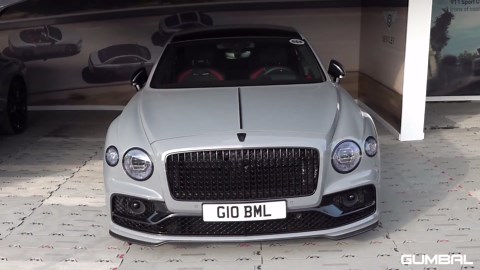 Bentley Flying Spur nearly spins on wet and slippery track