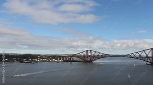 Boats on Firth of Forth with Forth Rail Bridge Scotland