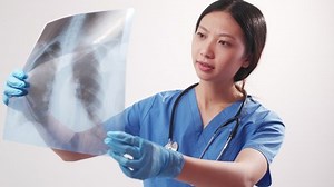 clip-1086841394-radiology-diagnosis-medical-treatment-health-care-serious