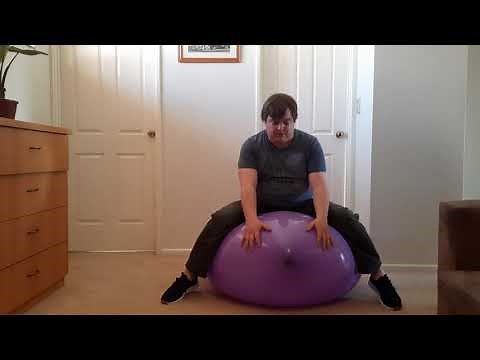 sitting on a purple 36 inch belbal balloon (nonpop)