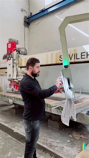 Operating a Large Industrial Saw Machine in Action