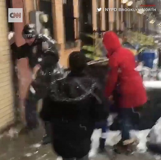 459K views · 5.1K reactions | These New York police officers were outnumbered in this playful snowball fight | CNN | Facebook