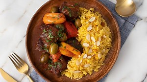 Spanish Beef Tips And Saffron-Almond Rice Recipe