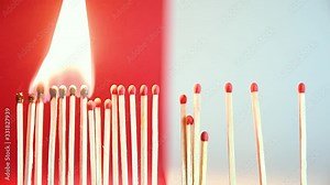 Social Distancing concept clip using matches igniting to depict how social distancing can help to flatten the curve / spread of the corona virus - Social healthcare and medical issues.