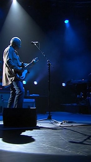Mark and Emmylou Harris performing 'Right Now', taken from the Real Live Roadrunning a concert film recorded live on 28th June 2006 at the Gibson Amphitheatre in Los Angeles. Watch the complete performance on YouTube: https://www.youtube.com/watch?v=dCiRap5a3Ms | Mark Knopfler