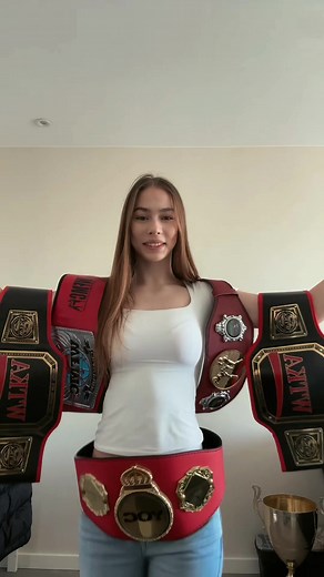 Muay Thai Fighter Championship Belts