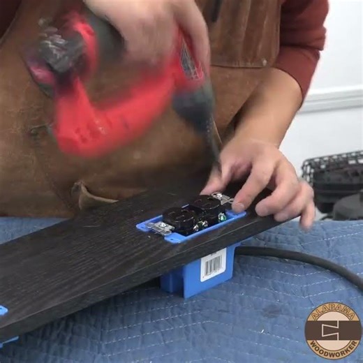 To hide the electrical cord that powered the conference table,