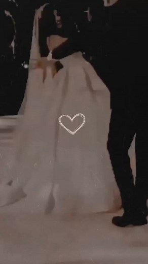 Elegant Couple Slow Dance in Romantic Setting