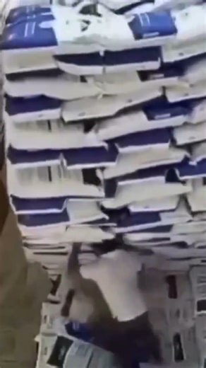 Actual accident footage captured in a warehouse The stacked bag suddenly collapse #shorts #viral