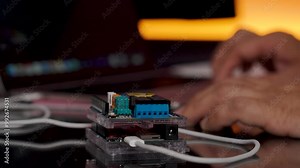 Microcontroller with four relays shield, program and upload to test the operation, Robot, Internet of Thaings (IoT).