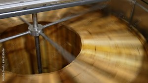 Centrifuge machine for harvesting honey. Organic food beekeeping production.