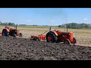 Twin Case 500's plowing w/ Case plows.