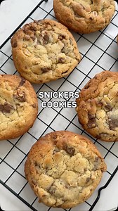 I don’t know how I’ve never made these!!! Snicker’s chocolate chunk cookies 🍪 🤤 for my son and his friends. They LOVED them! Makes 12 170g salted butter 150g (3/4 cup) brown sugar 100g (1/2 cup) granulated sugar 1 large egg (or 2 small) 1 tsp vanilla extract 250g (2 cups) self raising flour 1/2 tsp salt A pack of 4 snickers (approx 170g total) 100g milk chocolate 70g (1/2 cup) peanuts 180° for 13-15 mins until golden around the edges. These will spread so give them enough space | Lili Forberg 