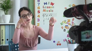 Concept music lesson online, back to school. The woman music teacher.