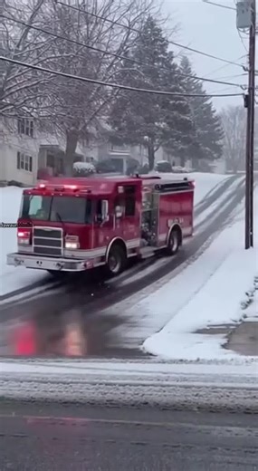 6K views · 33 reactions | Fire Ladder Truck Slides on Icy Hill, Ladder Smashes Street Fixtures 🚒❄️ St. Paul, Minnesota — Tuesday, February 25, 2025 Smartphone footage shows a long fire engine ladder truck sliding sideways down a steep residential hill coated in ice. As the truck spins, the extended rear ladder swings outward due to the momentum, sweeping across a nearby front lawn. The ladder strikes a streetlamp and a brick mailbox, shattering both as debris scatters across the snow. Authoriti