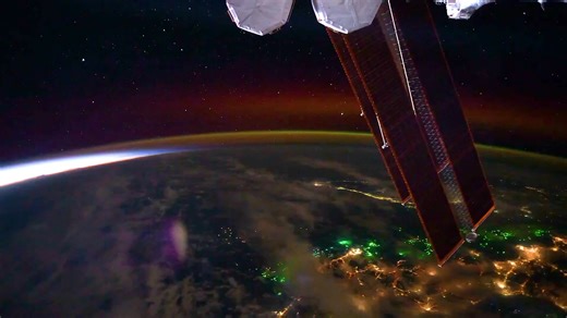 NASA astronaut Jonny Kim recorded time-lapse footage of aurora, lightning and city lights illuminating the night-side of Earth from the International Space Station. Read more 👉 https://space-com.visitlink.me/VavJud | Space.com