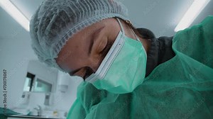 Female Dentist in Surgical Mask Treating Patient. Healthcare workforce concentrated at work