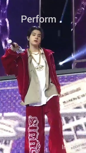 Jake with his baseball stick while performing at KBS Japan 2025