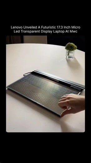 FACTS on Instagram: "Lenovo's Transparent Micro-LED Laptop Concept Shows the Future of Computing 657 At Mobile World Congress, Lenovo unveiled a futuristic laptop concept featuring a 17.3-inch transparent Micro-LED display. Unlike conventional laptops, the transparent screen allows users to see through the display while interacting with digital content layered on top. The concept replaces a physical keyboard with a touch-based and projected input system, highlighting new possibilities for mixed