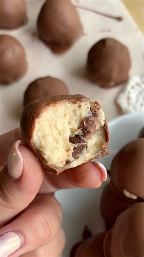 Save this one… you’ll be making it on repeat! ✨ These cottage cheese protein balls are my favorite mom hack right now—high protein, no baking, and they disappear faster than my teenage boys when I say the word “chores” 😅 Ingredients: * 1 cup cottage cheese, full fat 2-4% works best * 2 Tbsp maple syrup * 1 tsp pure vanilla extract * 1 ½ cups almond flour OR heat treated all purpose flour for a smoother texture. * ¼ cup vanilla protein powder * 1 ½ cups chocolate chips, divided * 1 tsp coconut o