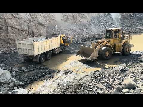 CAT 996T Loader Loading Massive Rocks into Dump Truck”“Heavy Equipment at Work | 996T LoaderMoving G