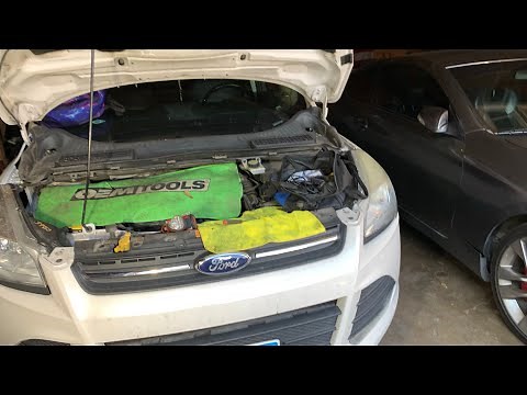 Part 7 2014 Ford escape SE 1.6 turbo valve cover DIY job. How to remove fuel injectors