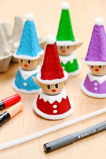 🎄♻️ Don’t toss that egg carton — turn it into the cutest little Christmas elf instead! These recycled egg carton elves are full of personality and SO much fun to make! 🧝‍♂️✨ https://onelittleproject.com/egg-carton-elf-craft/ | One Little Project