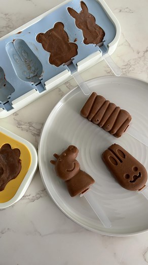 Stacy Ann • Baby, Toddler & Family Recipes on Instagram: "Treat your little ones to something special with these creamy Chocolate Fudge Popsicles! 💫Comment “FUDGE” for the recipe measurements and the link to the molds 😋 Made with wholesome ingredients like avocado, coconut milk, and a touch of maple syrup, they’re a delicious and nutritious way to cool off. Perfect for toddlers, these popsicles are dairy-free, refined sugar-free, and packed with healthy fats. ⚠️Just remember, cocoa powder is b