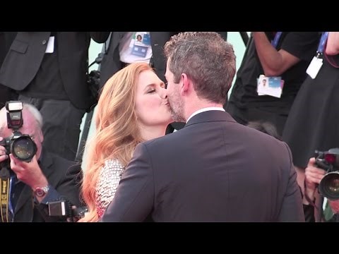Amy Adams and her husband share some love during the Premiere of Nocturnal Animals in Venice