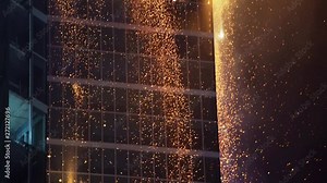 Hell fire spark flames from Warsaw hub tower skyscraper, follow shot