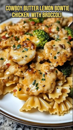 Cowboy Butter Lemon Bowtie Chicken with Broccoli Ingredients 300g bowtie (farfalle) pasta 2 chicken breasts, cut into bite-sized pieces 2 cups broccoli florets (fresh or frozen) 2 tablespoons olive oil Salt and black pepper, to taste 1/2 teaspoon paprika 1/2 teaspoon garlic powder For Cowboy Butter Sauce 100g unsalted butter 3 cloves garlic, minced Juice of 1 lemon 1 tablespoon Dijon mustard 1/2 teaspoon red pepper flakes 1/2 teaspoon smoked paprika 1 teaspoon chopped fresh parsley (or 1/2 tsp d