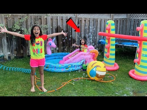 Deema Play with Inflatable water Toys in our backyard