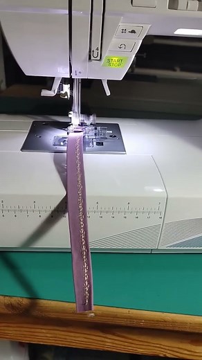 A Singer Quantum Stylist 9960 + Husqvarna Viking Adjustable Binder Foot = An Embroidery Ribbon Foot