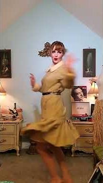 Dainty Rascal dancing in vintage fur lined coat