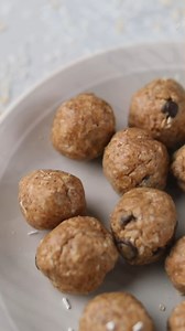 These almond protein balls are a quick, no-bake healthy dessert! They're high in protein, gluten-free, and ready in just a couple of hours. Kid-approved and easy to make vegetarian or vegan! | All Nutritious