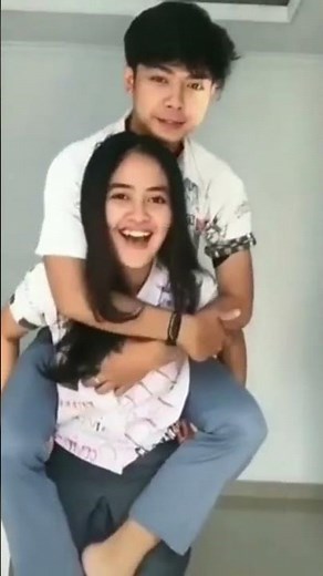 cute girl giving piggyback ride