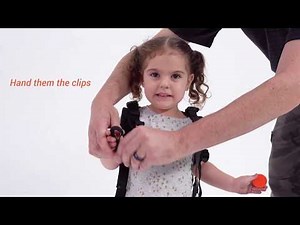 Piggyback Rider Instructional Video: Safety Harness Adjustments for Child