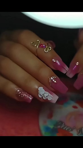 Stunning Pink Gradient Nail Art with Floral Accents