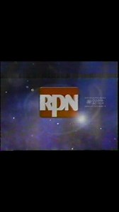 Nauna pa sakin sina theSandies at UndustFixation RPN 2003 Station ID: "Moving Ahead" * Visual Elements: * The video transitions to an animated sequence featuring a red vertical line on the left side of the screen, with a blue background and a green curved line [00:03]. * As the animation progresses, the red line moves to the right, and a white 3D text "RPN" emerges from the bottom right, rotating and settling into place [00:07]. * The "RPN" text is white and positioned on a red square background