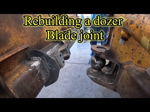 Replacing a badly worn blade center joint on the John Deere 450G dozer rebuild part6