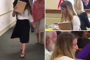 Maths teacher, 25, accused of romps with THREE pupils hides her face a she arrives at court