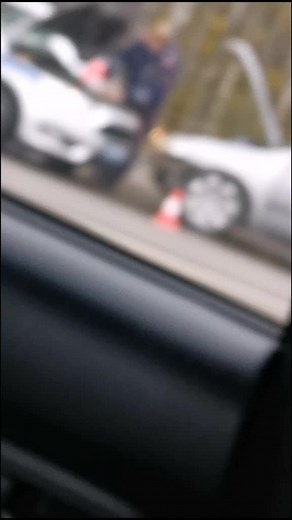 Traffic Incident Assessment: White Car Damage Report