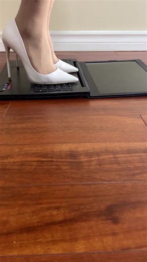 High Heels Crushing Laptop: Satisfying Destruction