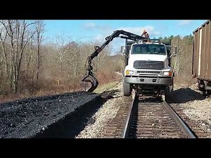 Cleaning Up a Huge Coal Spill on the Railroad Track - Hulcher in for the Rescue