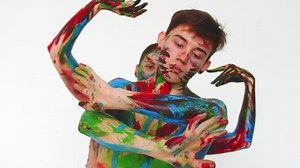 Two people dancing covered in body paint - Free Stock Video